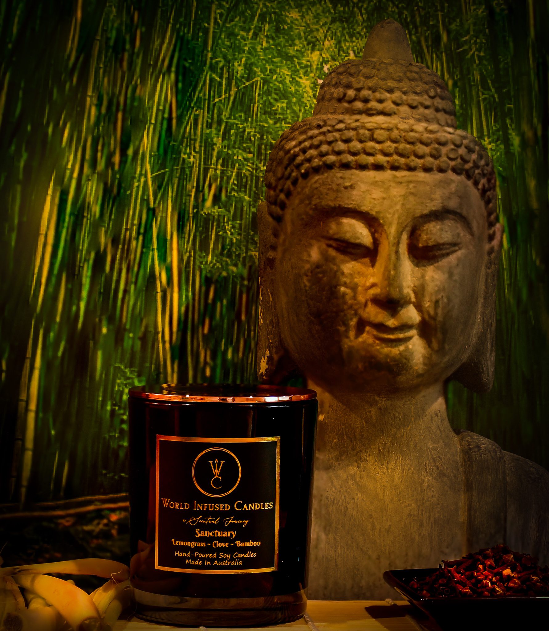 Sanctuary Lemongrass and Bamboo Candle is combined with Clove buddha statue in the background with bamboo